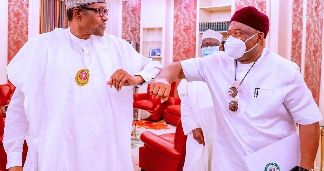 1. GOVERNOR HOPE UZODINMA OF IMO STATE WITH PRESIDENT BUHARI Image